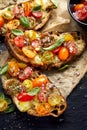 Tomato bruschetta with cheese and herbs Royalty Free Stock Photo