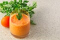Tomato and carrot gaspacho in glass on the table Royalty Free Stock Photo