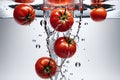 tomato caught mid-air with droplets of water cascading around it, positioned centrally against a stark backdrop