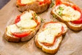 Tomato and cheese crostini