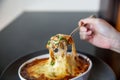 Tomato cheese risotto with spoon melting cheese in the kaiseki fine dining Japanese restaurant