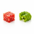 Tomato cubes and a stack of green bell pepper slices are neatly Royalty Free Stock Photo
