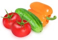 Tomato, cucumber and orange pepper on isolated white background Royalty Free Stock Photo