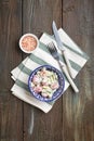 Tomato and cucumber salad with sour cream in a small bowl Royalty Free Stock Photo