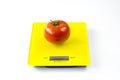 Tomato on Digital Scale Royalty Free Stock Photo