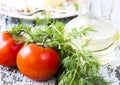 Tomato, dill on the wooden table Royalty Free Stock Photo