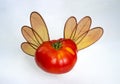 Tomato With Dragonfly Wings, Isolated On White Background
