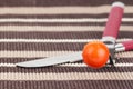 Tomato, fork and knife Royalty Free Stock Photo