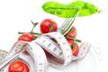 Tomato,fork and measure tape Royalty Free Stock Photo