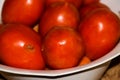 Tomato fruits in bowl on table