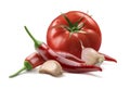 Tomato, garlic cloves, chili pepper isolated on white background