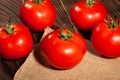 Tomato group on wood Royalty Free Stock Photo