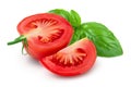 Tomato half and slice isolated on white background with basil leaf and full depth of field. Royalty Free Stock Photo