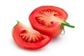 Tomato half and slice isolated on white background with clipping path and full depth of field. Royalty Free Stock Photo