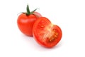 Tomato and half of tomato isolated on white background. Ripe red vegetables. Close up. Royalty Free Stock Photo