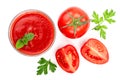 Tomato juice in glass and tomatoes with parsley leaves isolated on white background. Top view. Flat lay Royalty Free Stock Photo