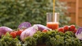 Tomato juice pouring into a glass Royalty Free Stock Photo