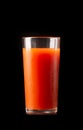 Tomato juice in a tall glass glass on a black background Royalty Free Stock Photo