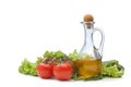 Tomato, lettuce salad and jug of vegetable oil oil isolated Royalty Free Stock Photo