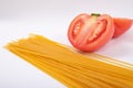 Tomato and pasta in white background Royalty Free Stock Photo