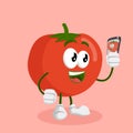 Tomato mascot and background with selfie pose Royalty Free Stock Photo