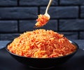 Tomato onion rice pilaf on a fork Royalty Free Stock Photo