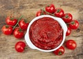 Tomato paste with ripe tomatoes Royalty Free Stock Photo