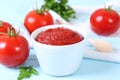 Tomato paste on the table top view. Tomato sauce.