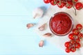 Tomato paste on the table top view. Tomato sauce.