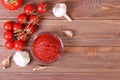 Tomato paste on the table top view. Tomato sauce.