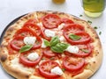 Tomato Perfection. Savoring the essence of tomato in every slice of pizza Royalty Free Stock Photo