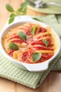 Tomato, potato and mozzarella gratin