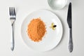 Tomato protein soup powder and multivitamins on a plate. Meal replacement. Dry soup. Multivitamins, astaxanthin, fish oil, omega