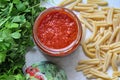 Tomato puree in a jar, pasta, parsley, shimeji mushrooms, ingredients for a pasta dish Royalty Free Stock Photo