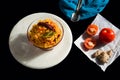 Tomato rice served in a bowl,isolated on black background.Top view.Copy space. Royalty Free Stock Photo