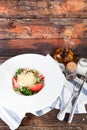 Tomato salad with basil, cheese, olive oil and garlic dressing, Royalty Free Stock Photo