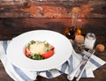 Tomato salad with basil, cheese, olive oil and garlic dressing, Royalty Free Stock Photo