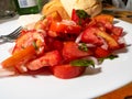 Tomato salad with basil onion and olive oil