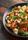 Tomato salad with feta cheese, spring onion and parsley. Healthy summer food Royalty Free Stock Photo