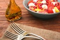 Tomato salad, mango and mozzarella with pomegranate seeds Royalty Free Stock Photo