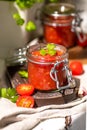 Tomato salsa in a glass jar Royalty Free Stock Photo