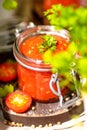 Tomato salsa in a glass jar Royalty Free Stock Photo