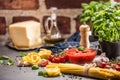 Tomato sauce tomatoes basil pasta spaghetti olive oil and parmesan Royalty Free Stock Photo