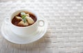 Tomato soup. A bowl of fresh tomato soup in white ceramic bowl, garnished with herbs, Delicious pumpkin soup with heavy cream Royalty Free Stock Photo