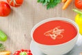 Tomato soup, soup in bowl on white plate Royalty Free Stock Photo
