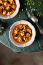 tomato soup with cappelletti pasta, cream and basil