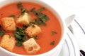 Tomato soup with croutons in bowl on white Royalty Free Stock Photo