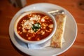 Tomato Soup With Goat Cheese and Flat Bread Stick Royalty Free Stock Photo