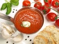 Tomato Soup in a Soup Ladle on white Background - Isolated Royalty Free Stock Photo