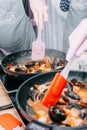 Tomato soup with mussels. The process of cooking tomato soup from mussels in a cooking class. Home-made food Royalty Free Stock Photo